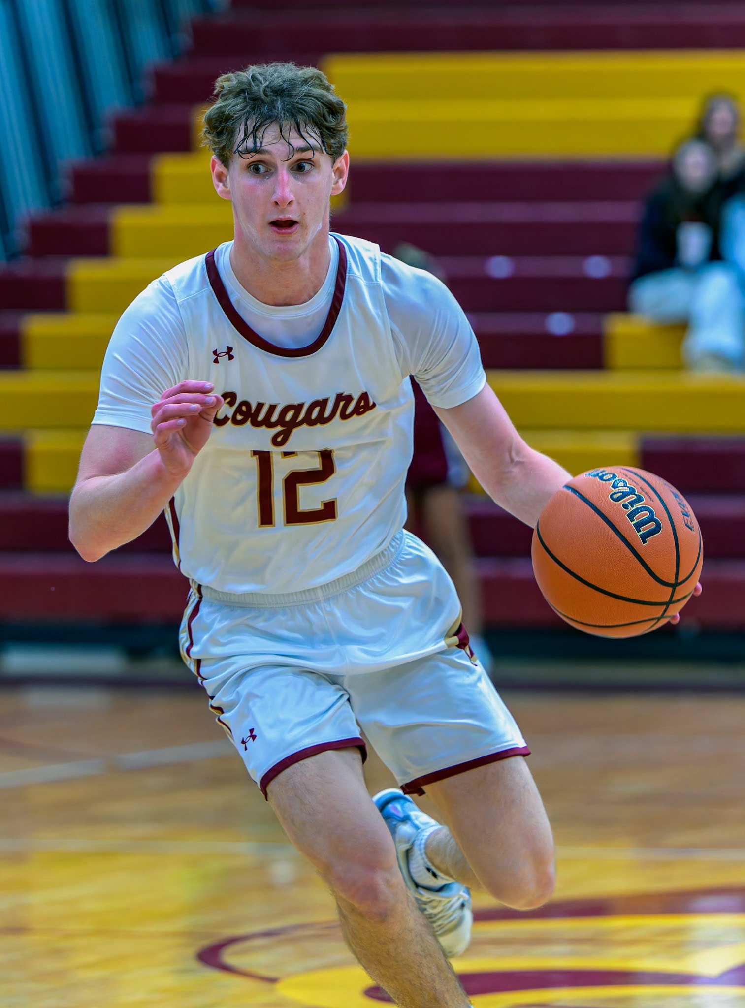Oakton player drives the lane